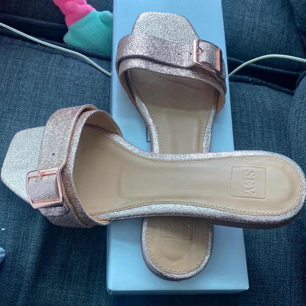 Only worn once, slip on sandals